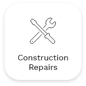 An icon with a screwdriver and wrench crossed over each other above the text "Construction Repairs" on a white background with rounded corners, highlighting our expertise in both interior and exterior repairs.